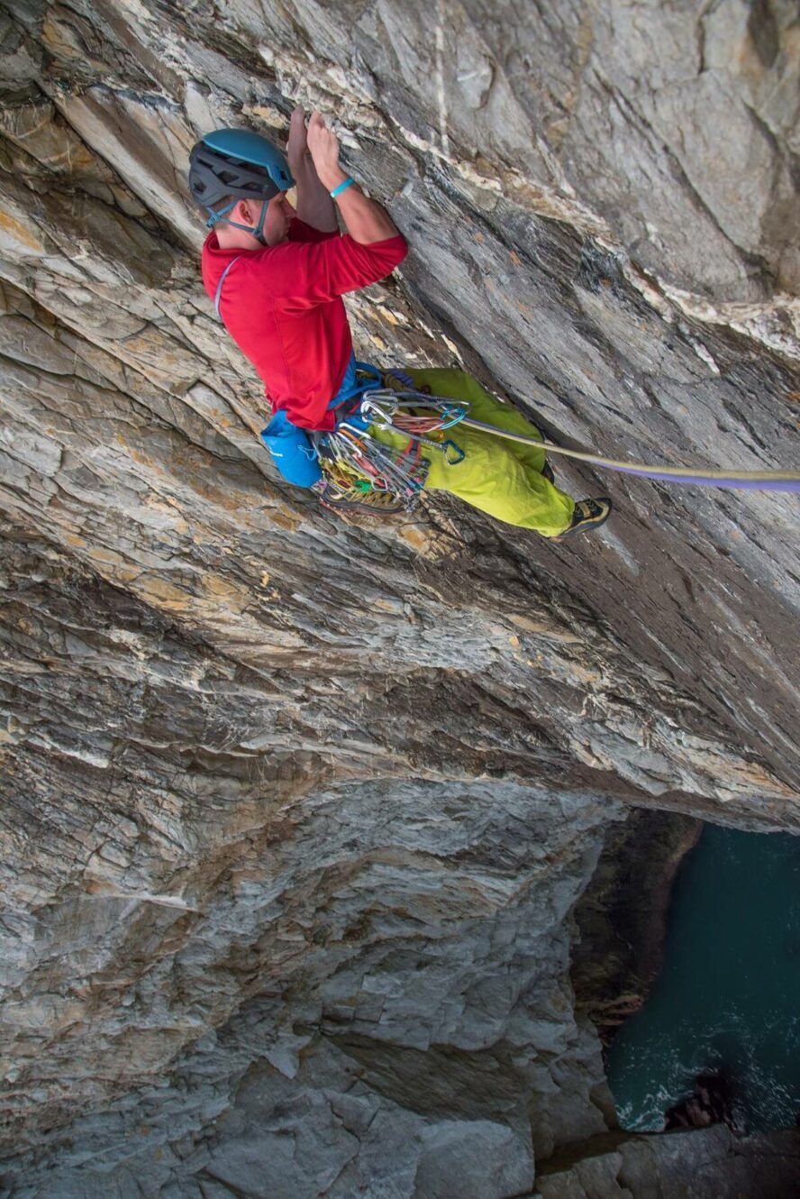 Will Points leading the stunning traverse pitch on A Dream of White Horses