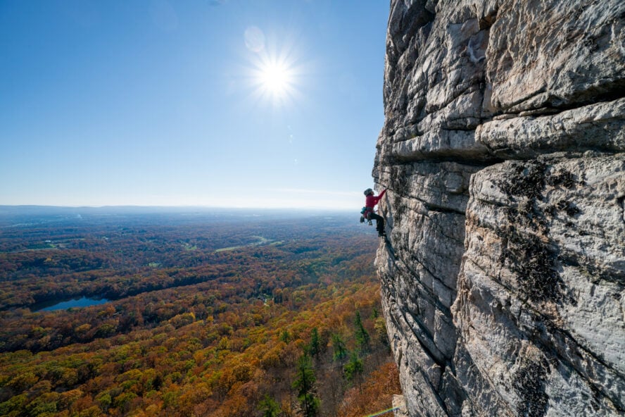 Marjana Tafader on the sharp end of High Exposure overlooking the Hudson Valley and New Paltz