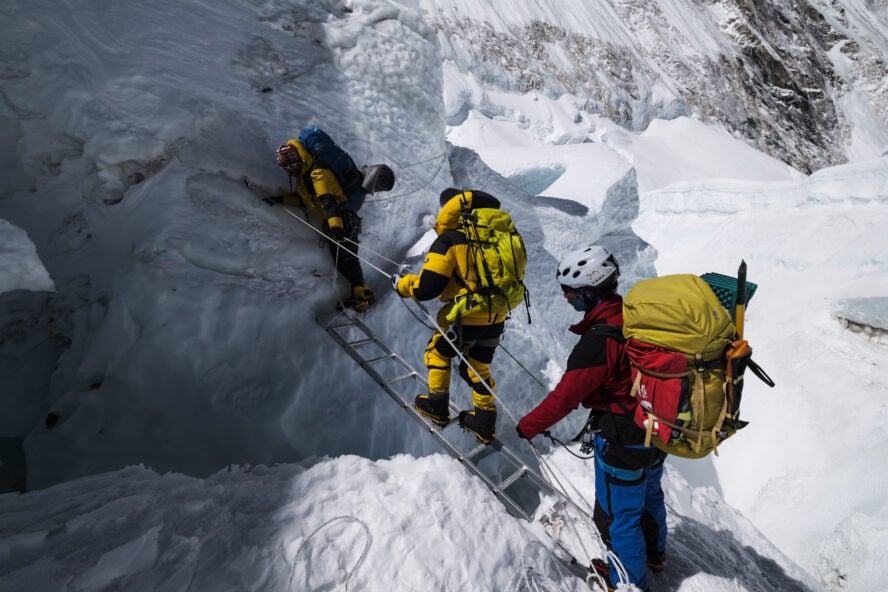 A step above the void, just one of many ladders through Mount Everest’s Khumbu Icefall