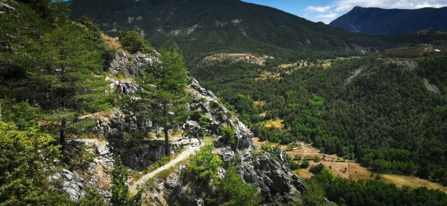 Mountain biking on the last few sharp corners on the descent into Briançon.