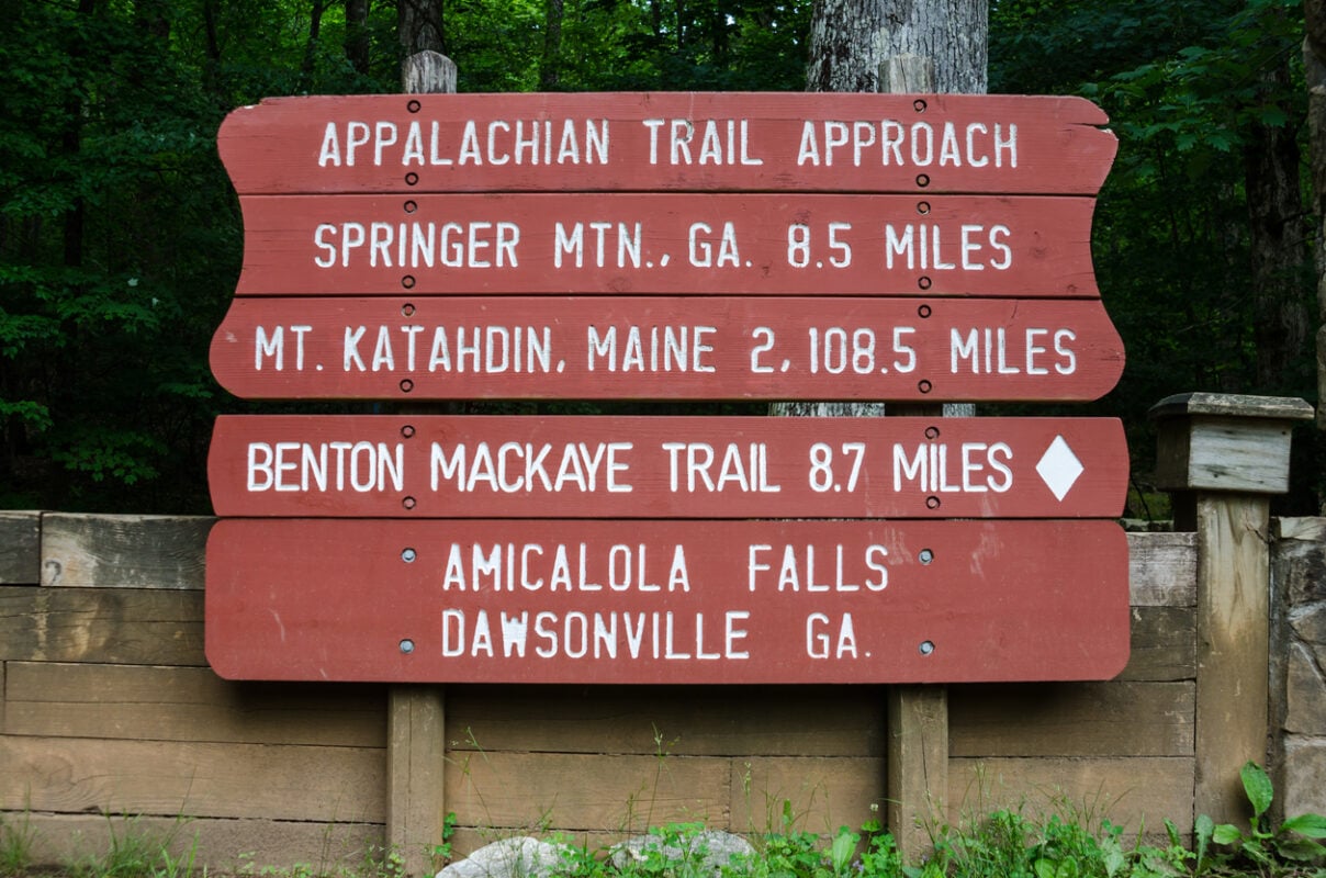 A painted sign gives the distance to Maine from Georgia on the Appalachian Trail