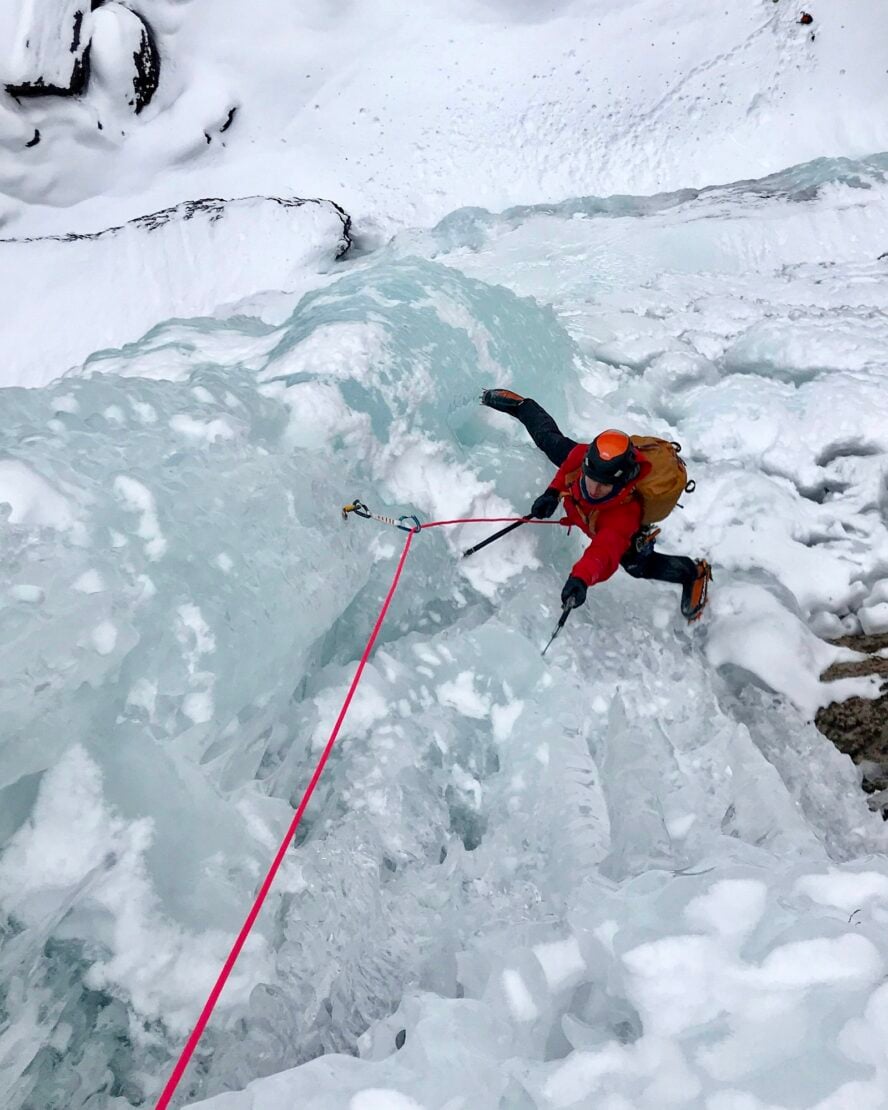 A climber follows up pitch two of the Telluride water ice classic, Bridalveil Falls.