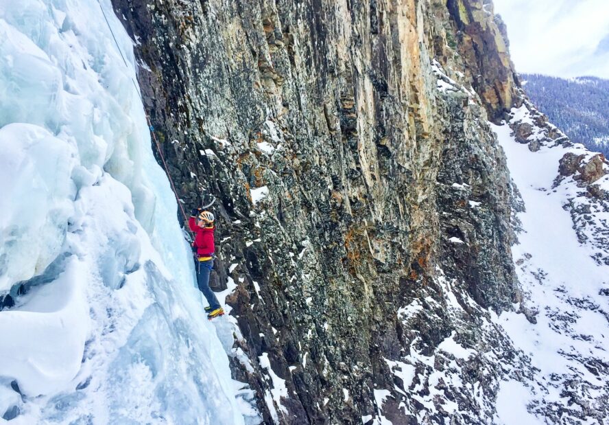 A climber on the final pitch of Whorehouse Hoses rated WI 4-5. 