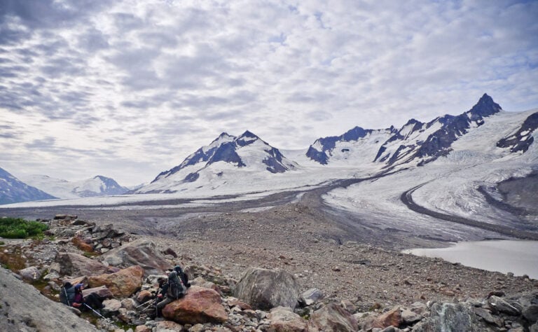 Backpackers admiring the glacial landscape of Denali.