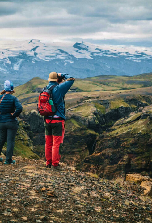 Two hikers just enjoying one of the dramatic viewpoints of Iceland.