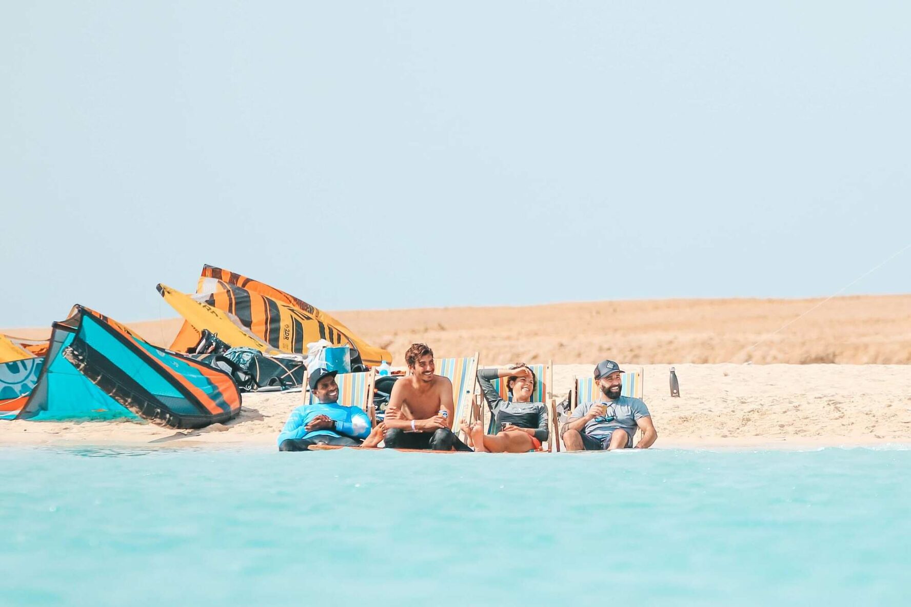 Kitesurfers relaxing on an island in the Red Sea, Egypt