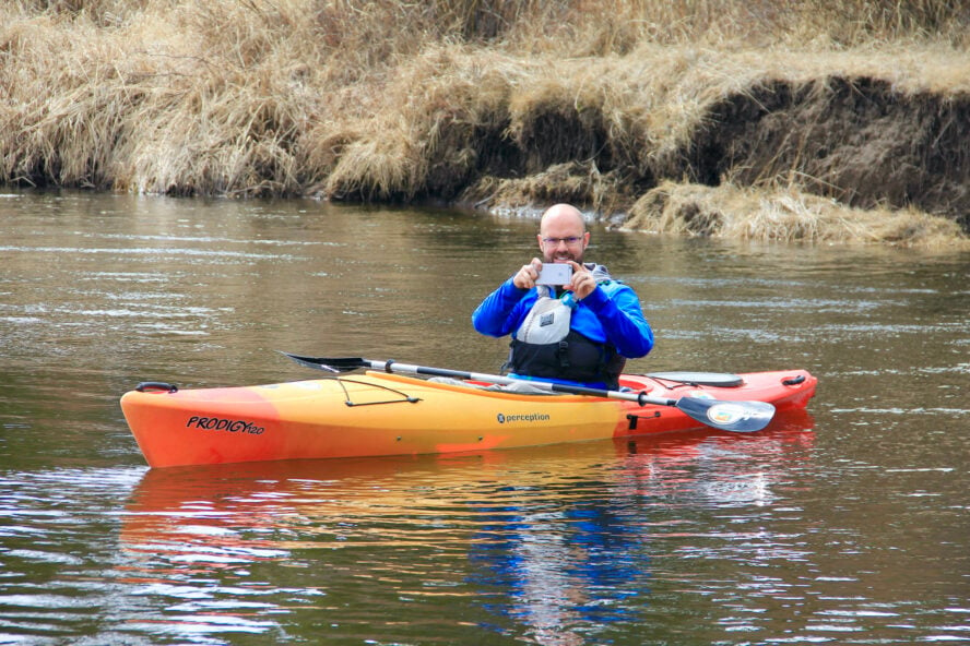 Kayaking and taking photos on the Little Deschutes River, Bend, Oregon. 