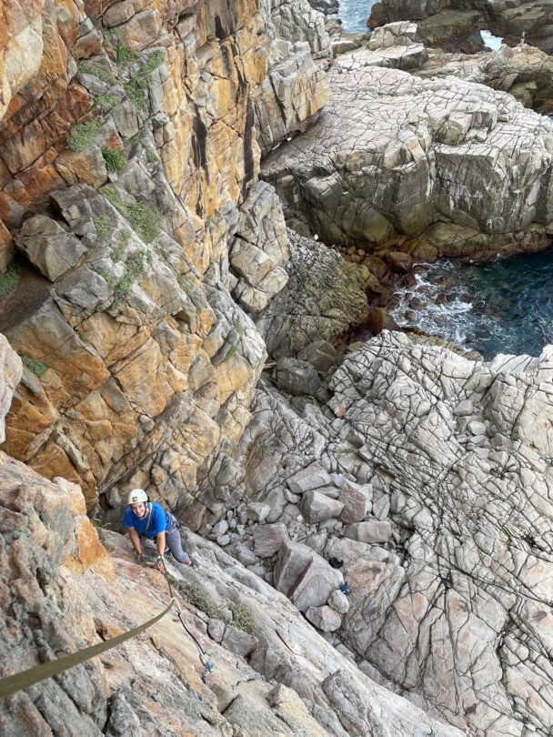 A woman climbing at Long Dong