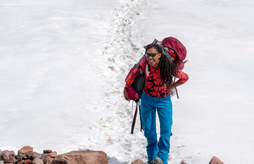 The author’s winter hiking backpack is nearly the same size as her body.