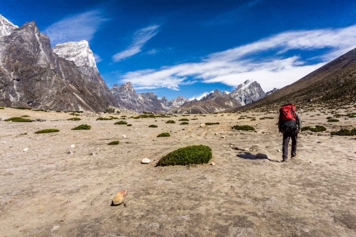 Hiker near Dingboche in Nepal. 