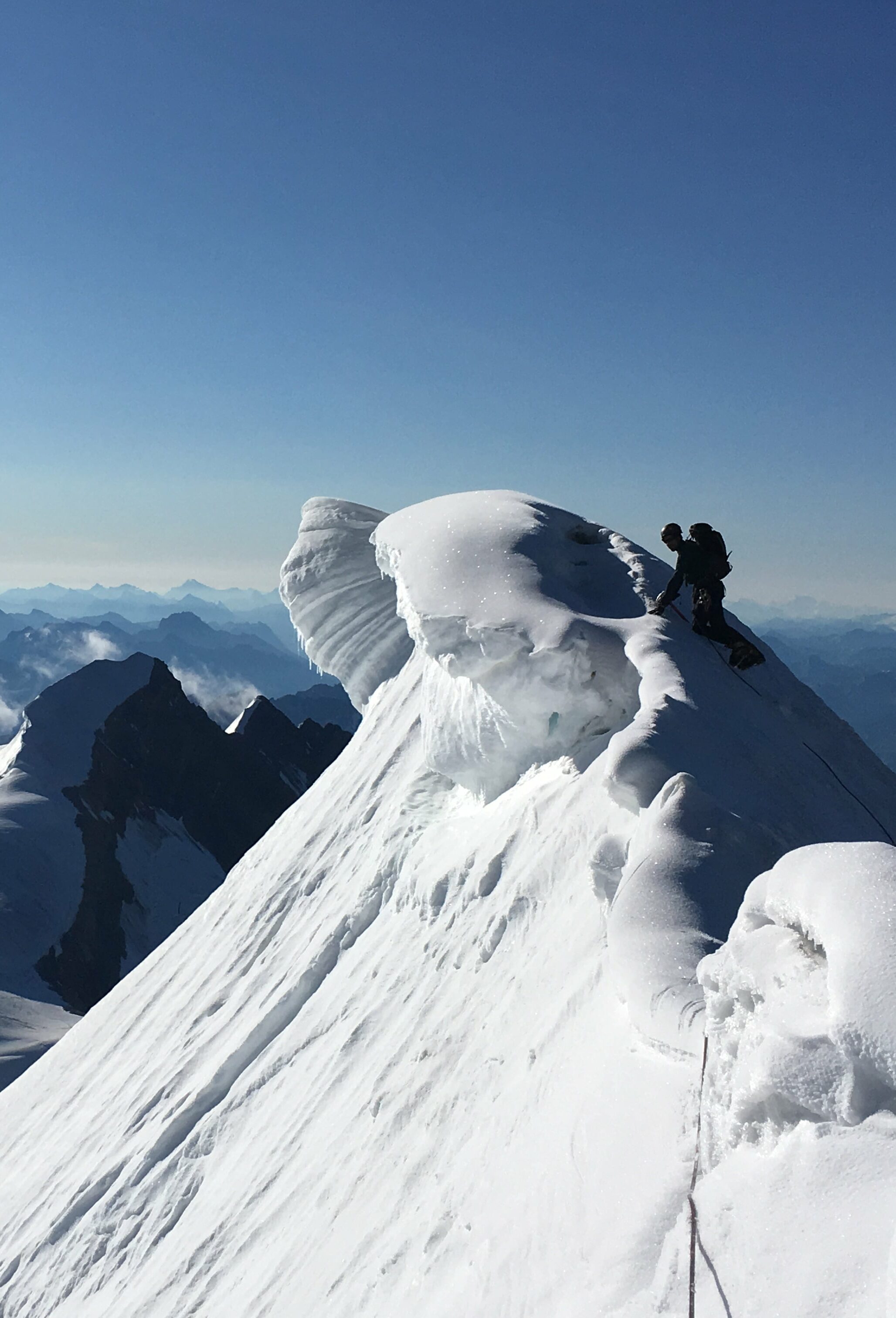 My long-time friend Brad up on Mt. Robson, the highest peak in the Canadian Rockies, after a technical multi-day climb. Photo by Jeff Bullock