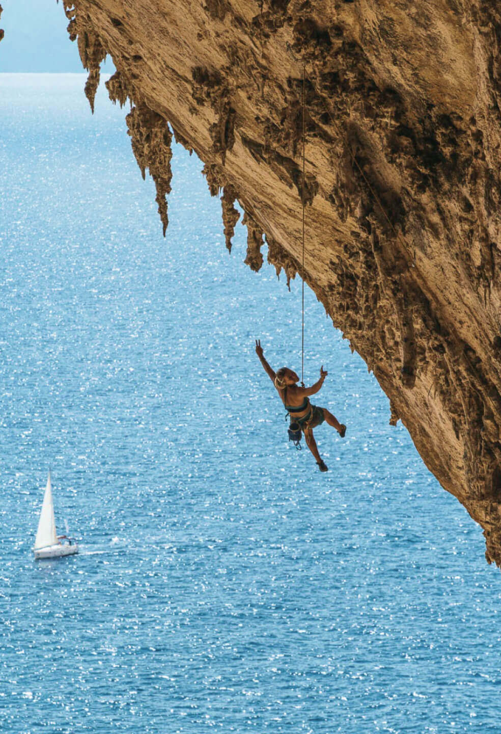 It is not uncommon for Sardinia to have a rock climbing spot with you hanging right above the Mediterranean Sea.