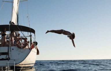 While sailing around Sardinia, why not jump in the crystal clear waters of the Mediterranean Sea?