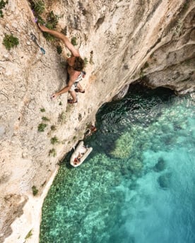 Climbing on a cliff beside the sea in Sardinia is an invigorating experience.