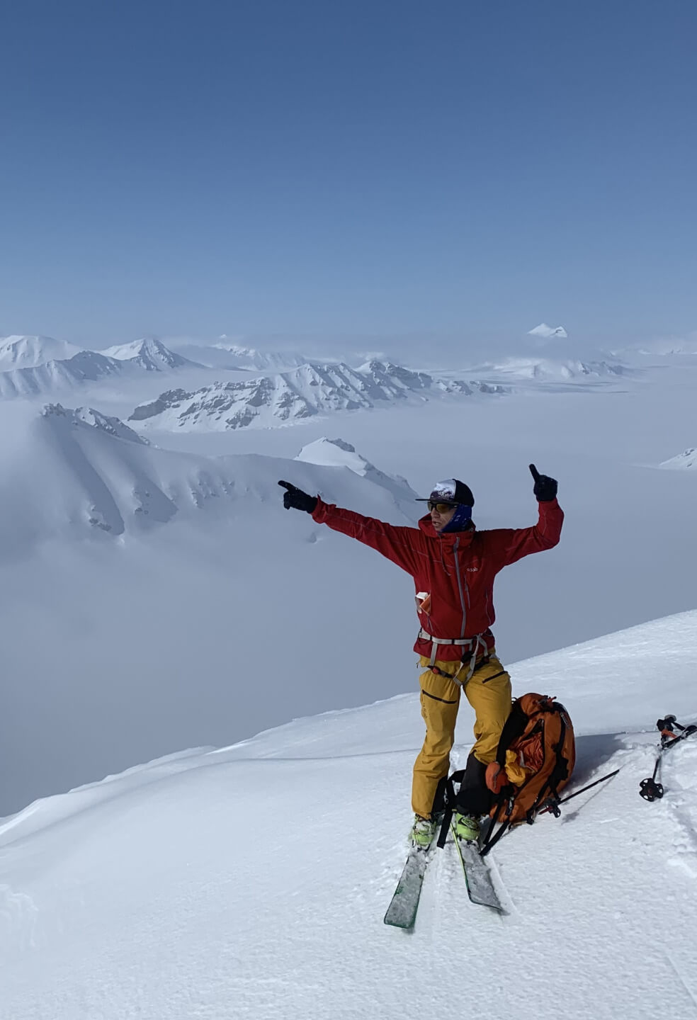 A skier celebrating the arrival on the summit of Svalbard.