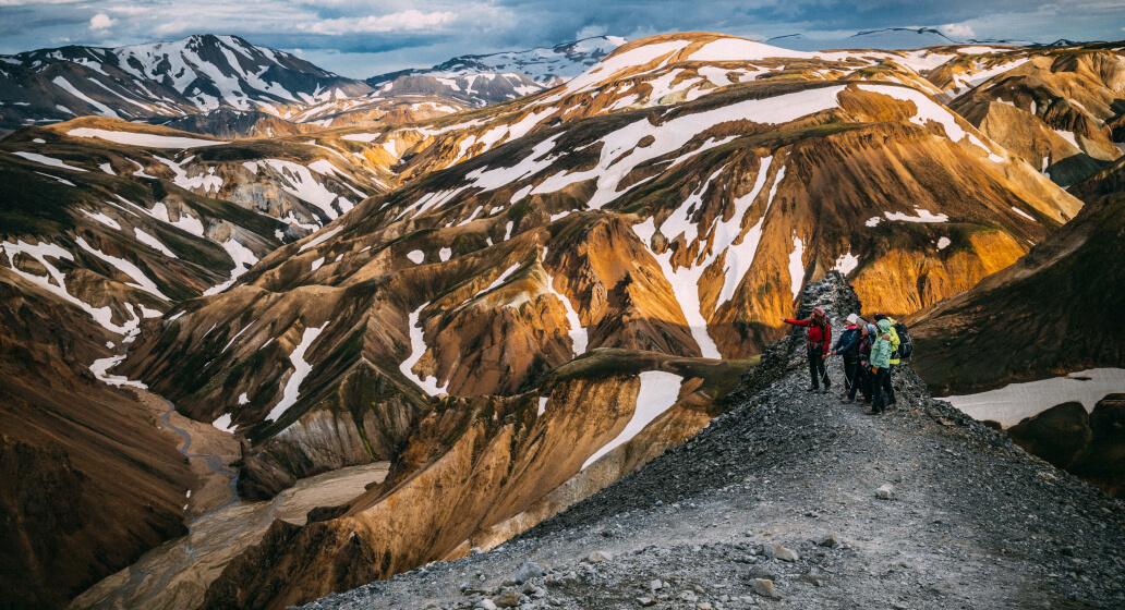 The guide showing the majesty of the Valley of Landmannalaugar.