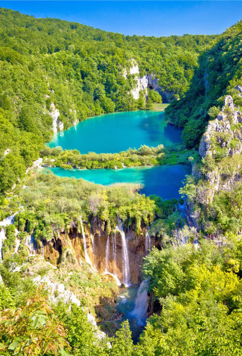 Plitvice Lakes is a breathtaking complex of 16 turquoise lakes that end with a 78-meter tall waterfall.