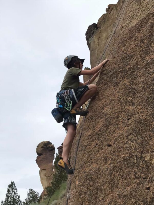 A boy climbing in Smith Rock State Park