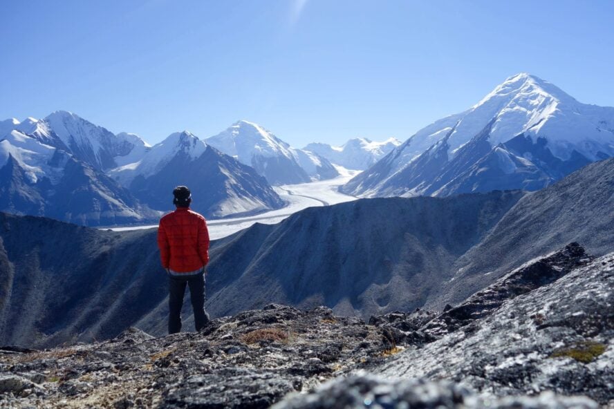 A backpacker soaking up far-reaching views