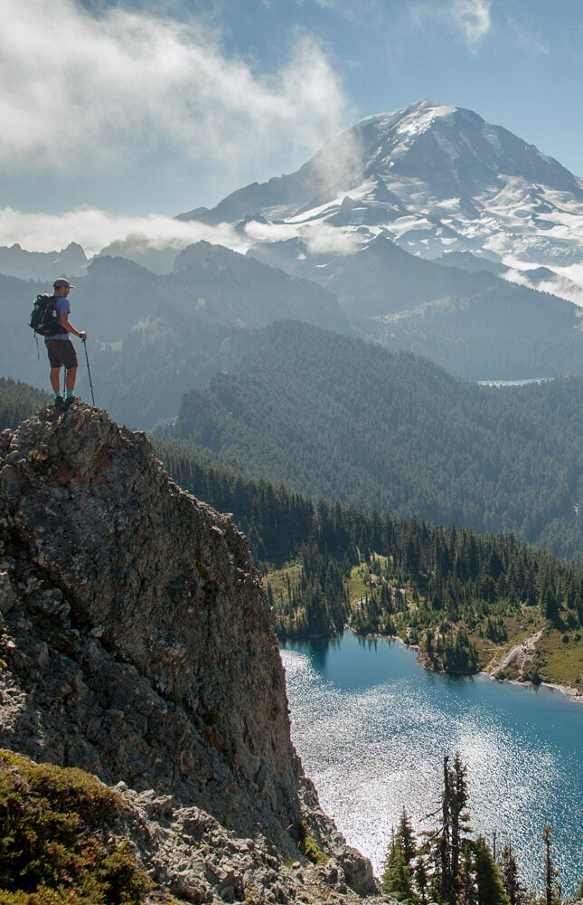 Woman Wearing A Hat And Sports Clothes Relaxing During A Mountain