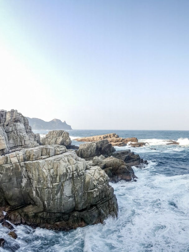 A woman climbing at Long Dong