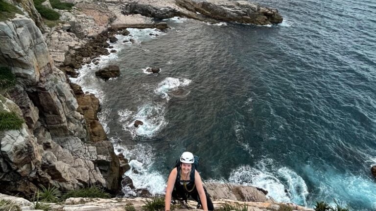 A woman climbing at Long Dong