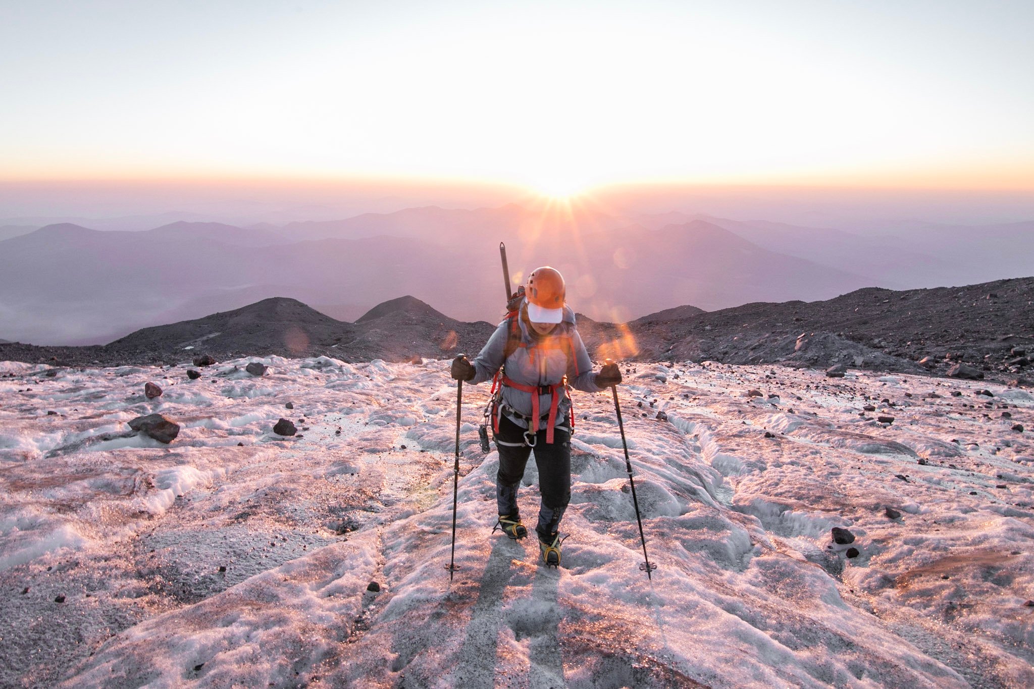 Hot tea ,cup, tea pot at cold morning with sunrise in the foggy mountains  Stock Photo