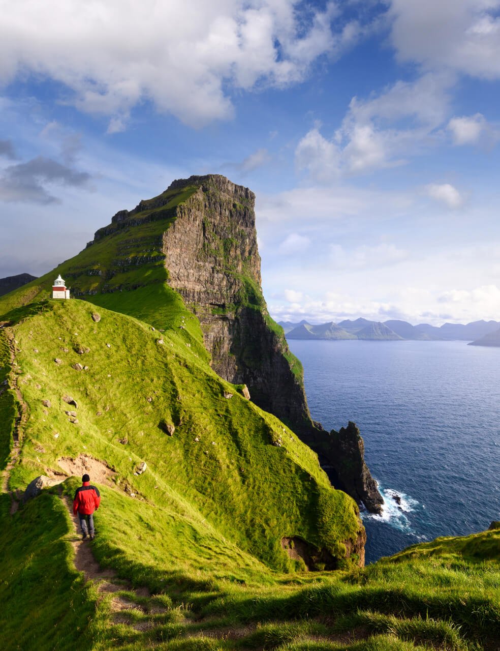 Faroe Islands are full of breathtaking hiking trails such as the trail to Kallur Lighthouse.