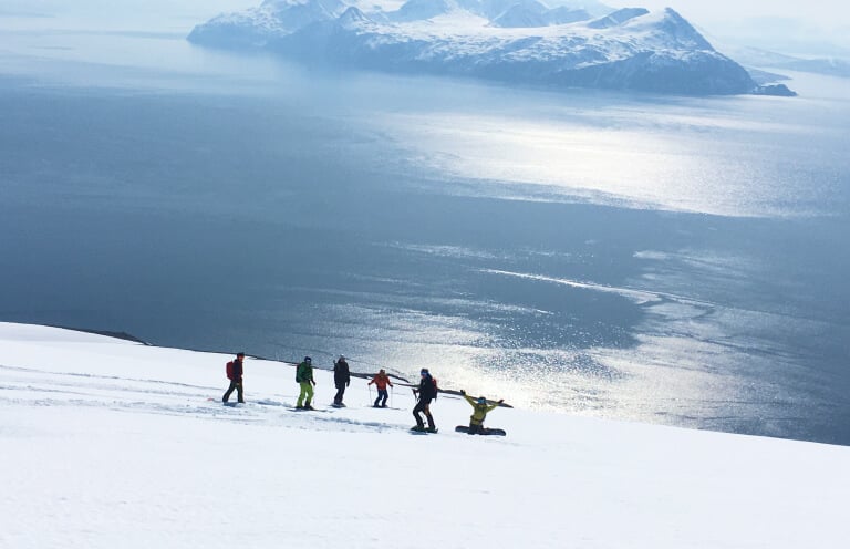 Gazing at the ice-cold sea from the snowy slopes of Svalbard.