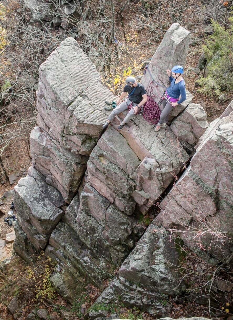 Climbers sit at the top of one of the many pillars found in the sector of Cleopatra’s Amphitheater. 