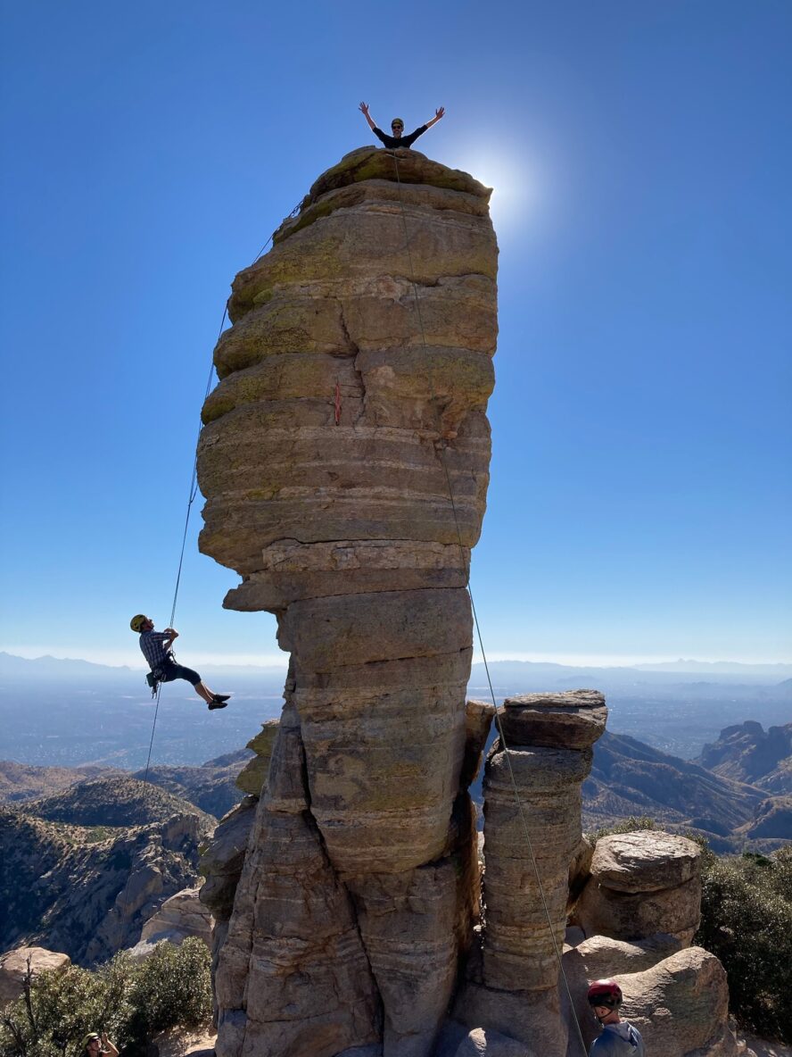 Climbers atop Hitchcock Pinnacle, one of the most recognizable rocks on Mt. Lemmon.