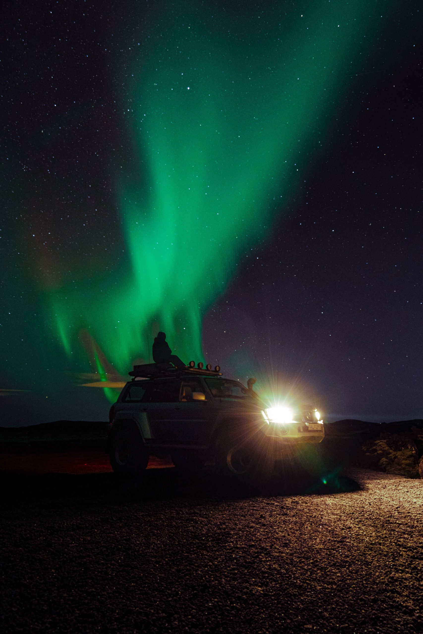 A dark night sky with green northern lights