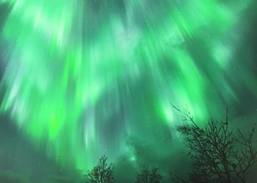 Unique colors of the aurora borealis are possible to view from the northern tip of Norway on this backcountry adventure.