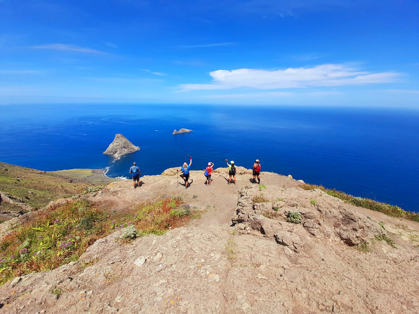 Hikers posing on a beach in Tenerife