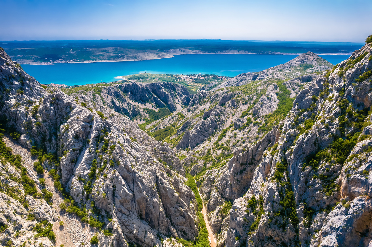 Canyons of Paklenica and Velebit photographed from air with Adriatic sea in the background