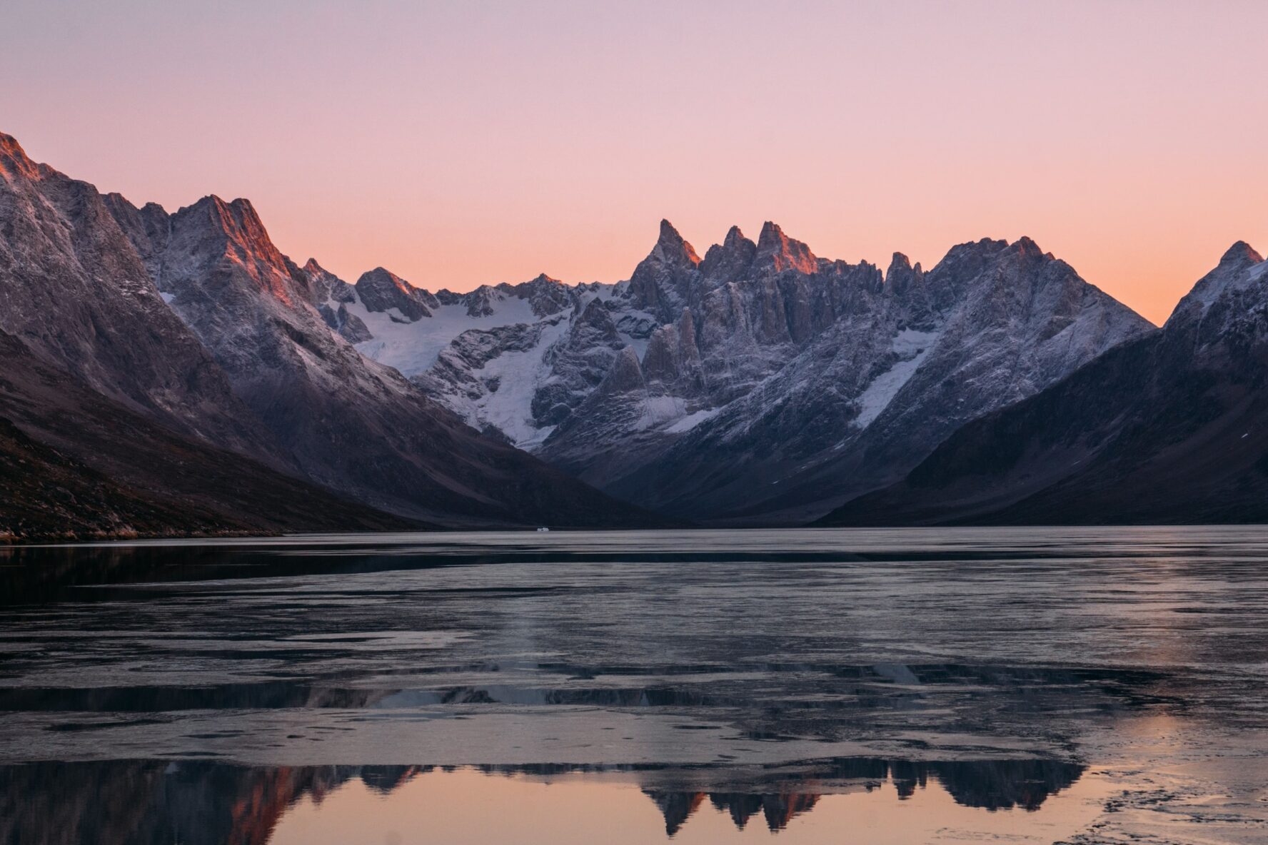 Greenland peaks reflecting the sea