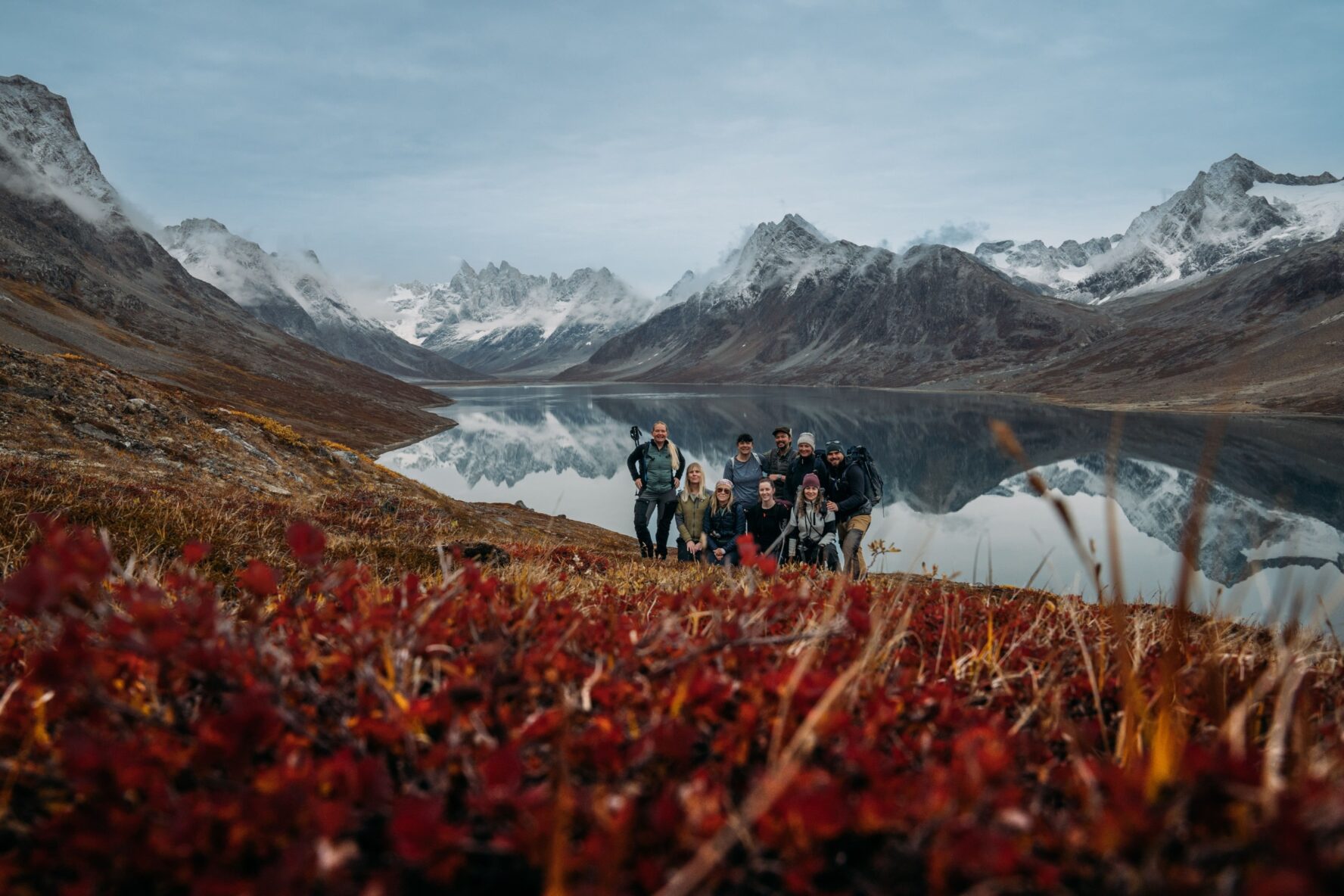 Group posing for a photo in Greenland