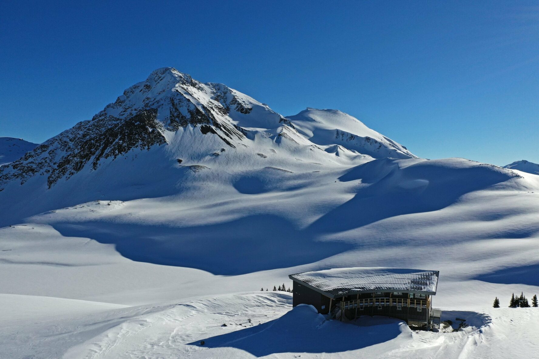 View of the Kees and Clair Hut in snow.