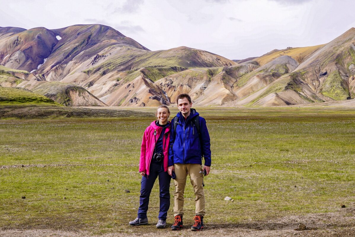 Two hikers posing along the trail in the Landmannalaugar valley