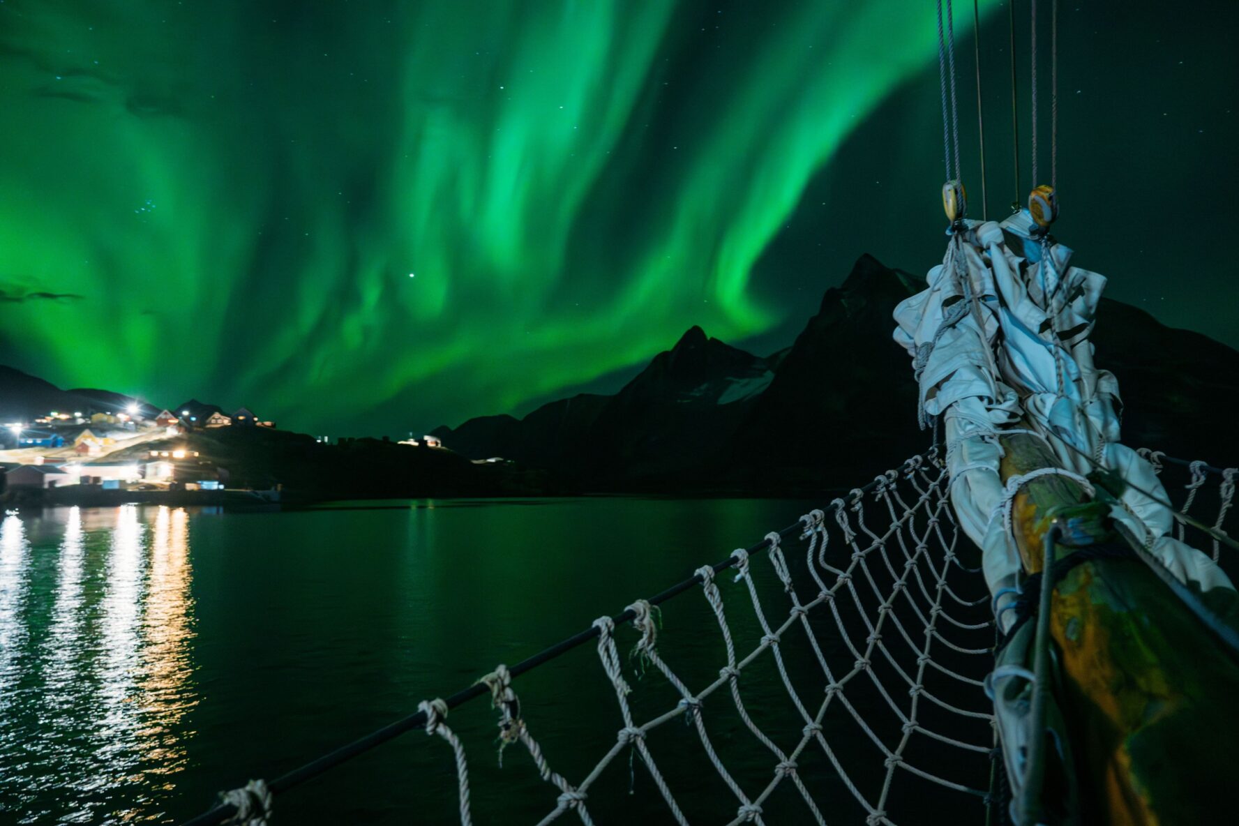 Northern lights and sailboat