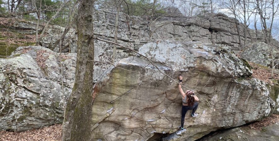 Caroline Vason climbs Standard Deviation (V6) at Rocktown.