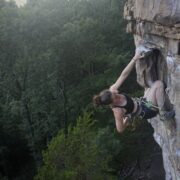 The author rests on Flash Fried (5.12b) at Denny Cove.