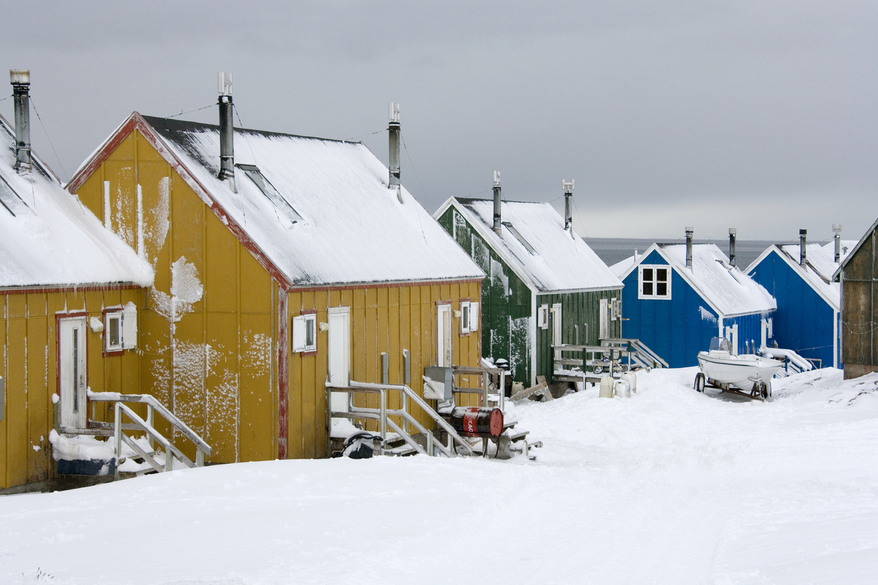 Village of Ittoqqortoormiit and houses of its Inuit inhabitants