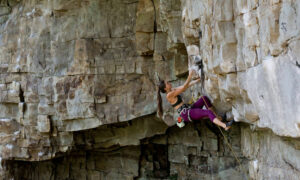 Sarah Anne Perry climbs a 5.12a in the first Bunker at Foster Falls.