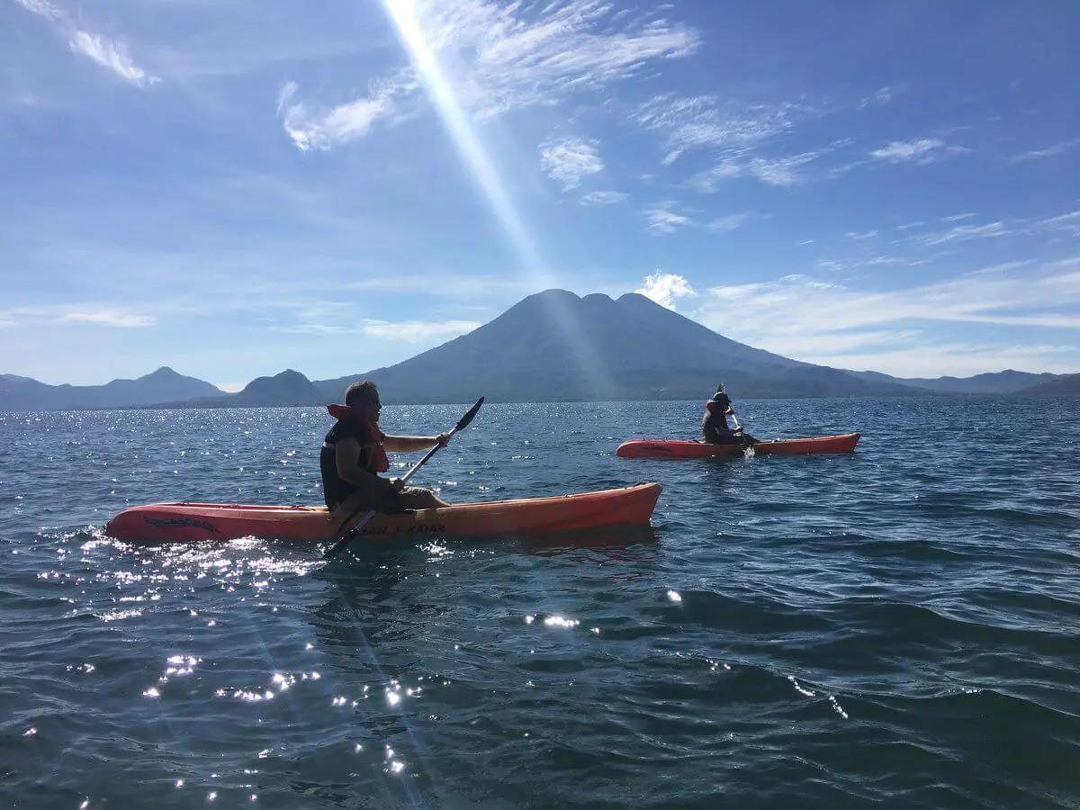 Kayakers exploring lake Atitlan in Guatemala