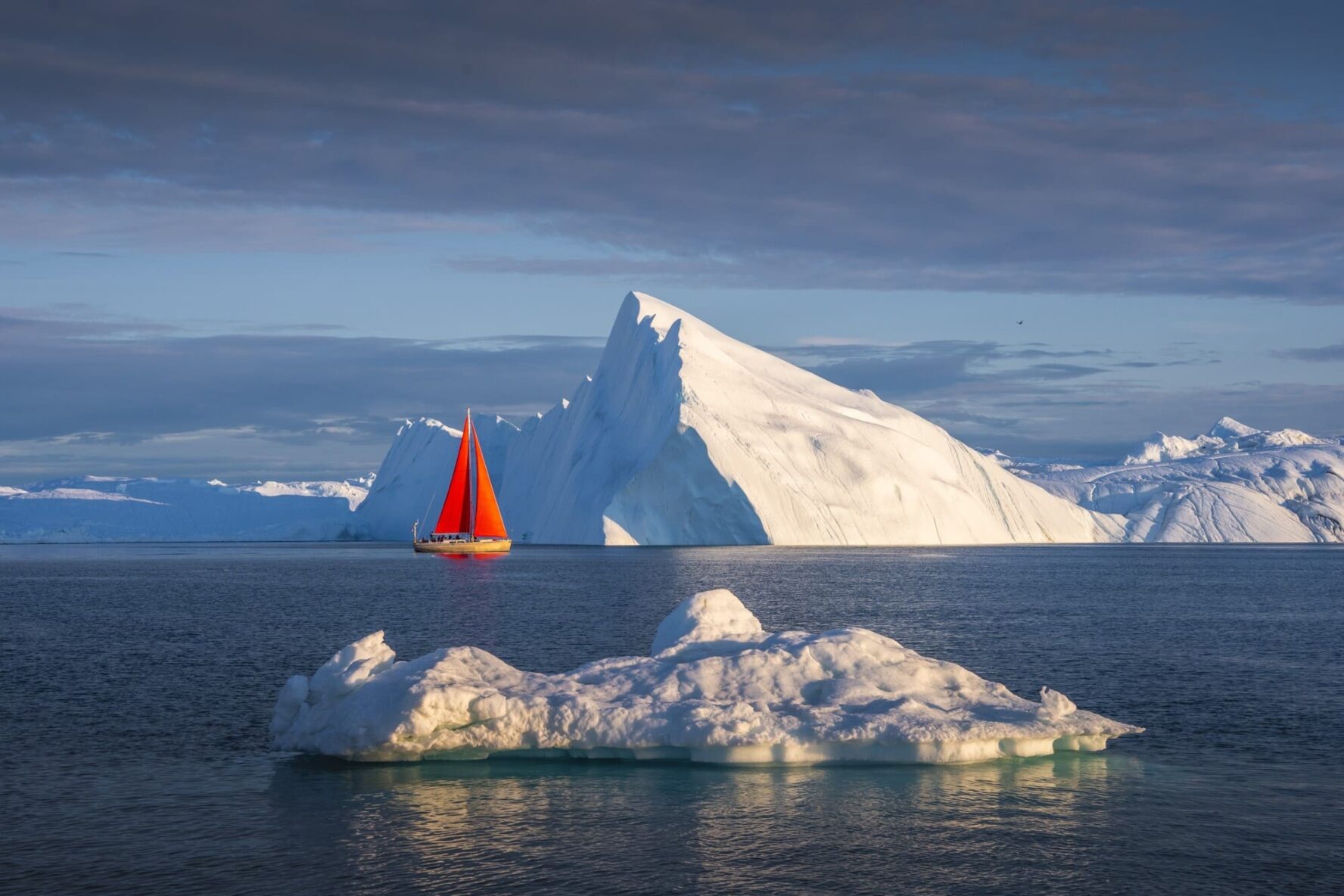 Boat afar Svalbard Moondance