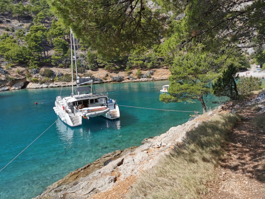 A catamaran in a cove on the island of Brac