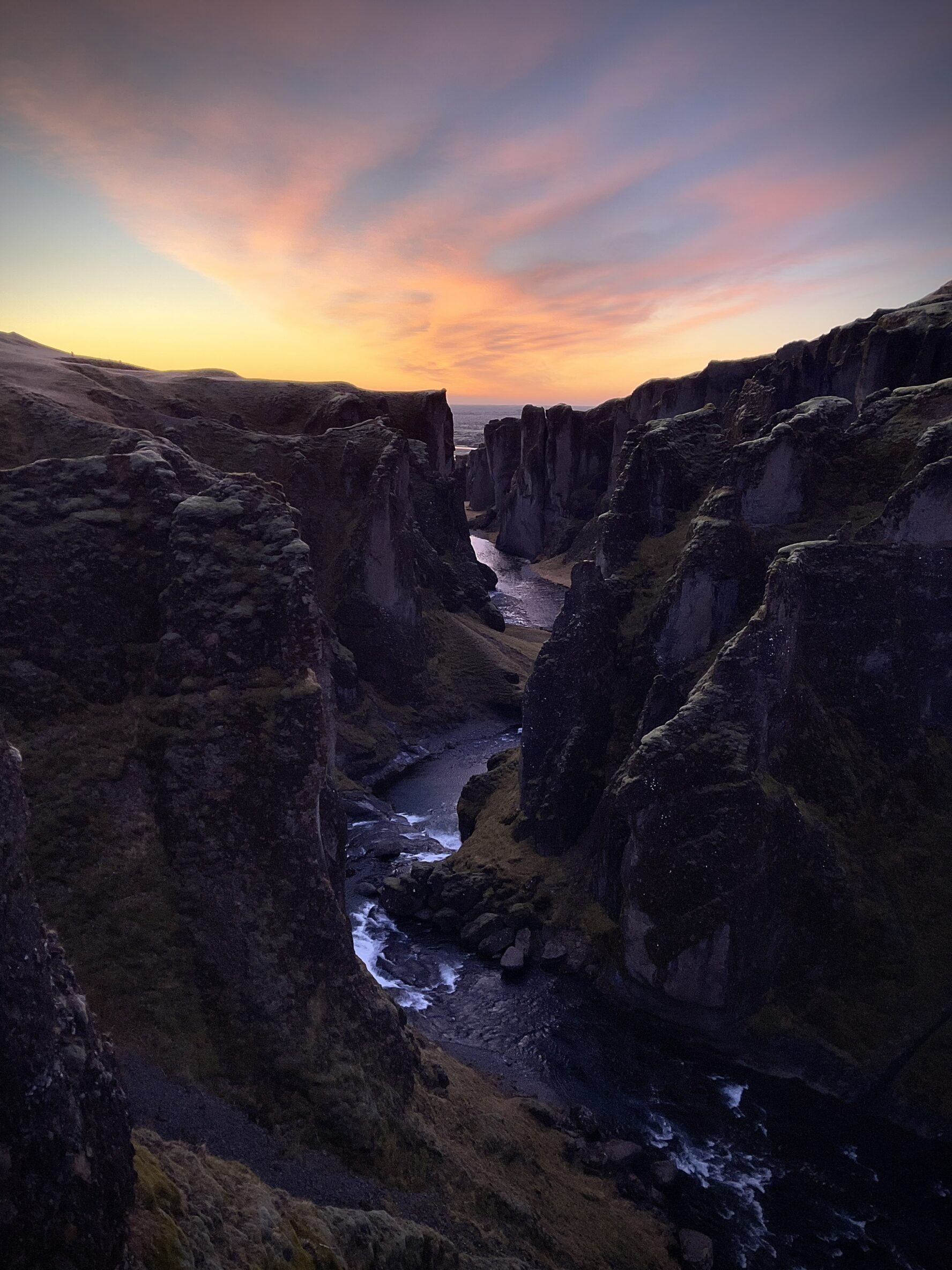 Canyon with a winding river passing through it