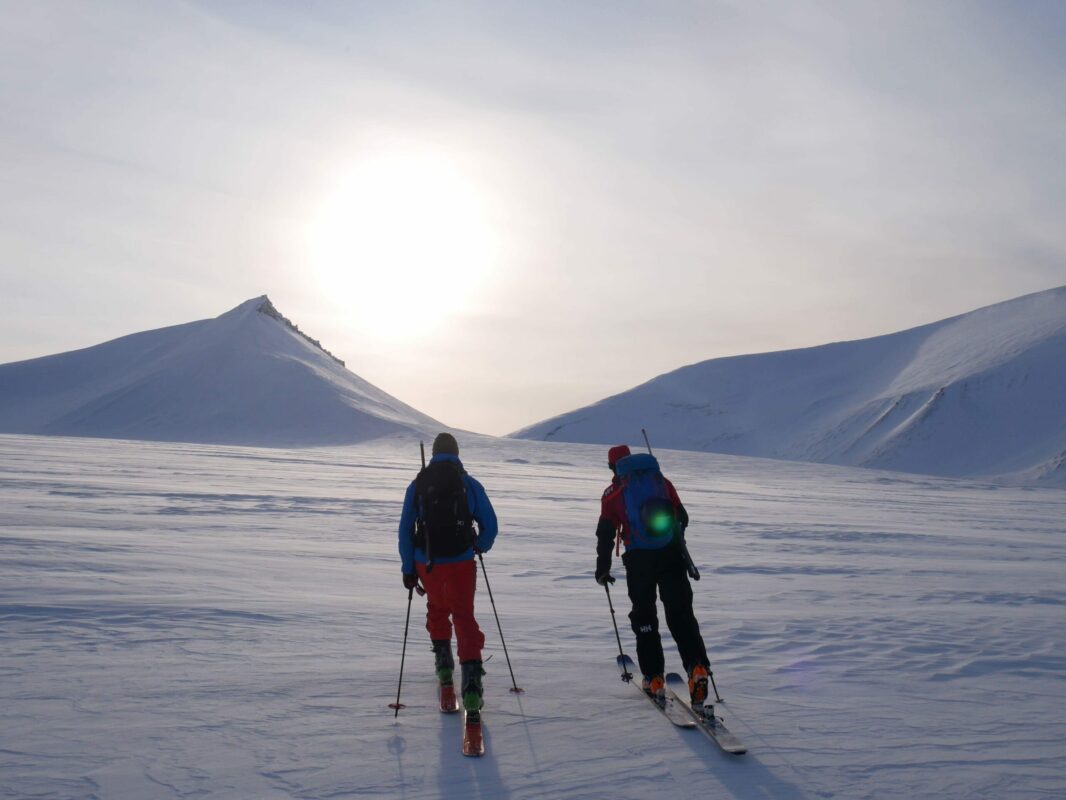 Tourers watching the midnight sun near Longyearbyen.