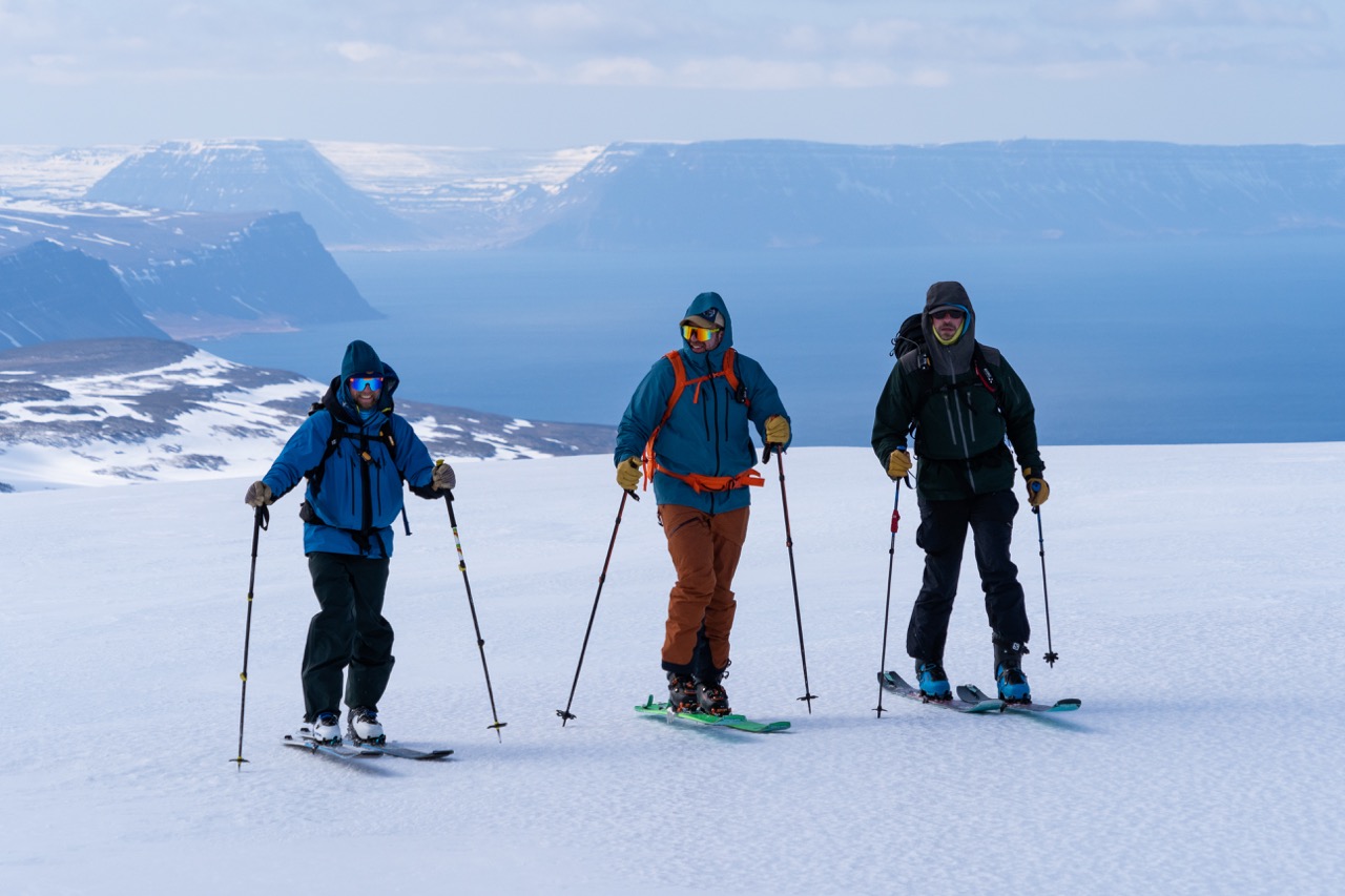 Skiers posing on the summit